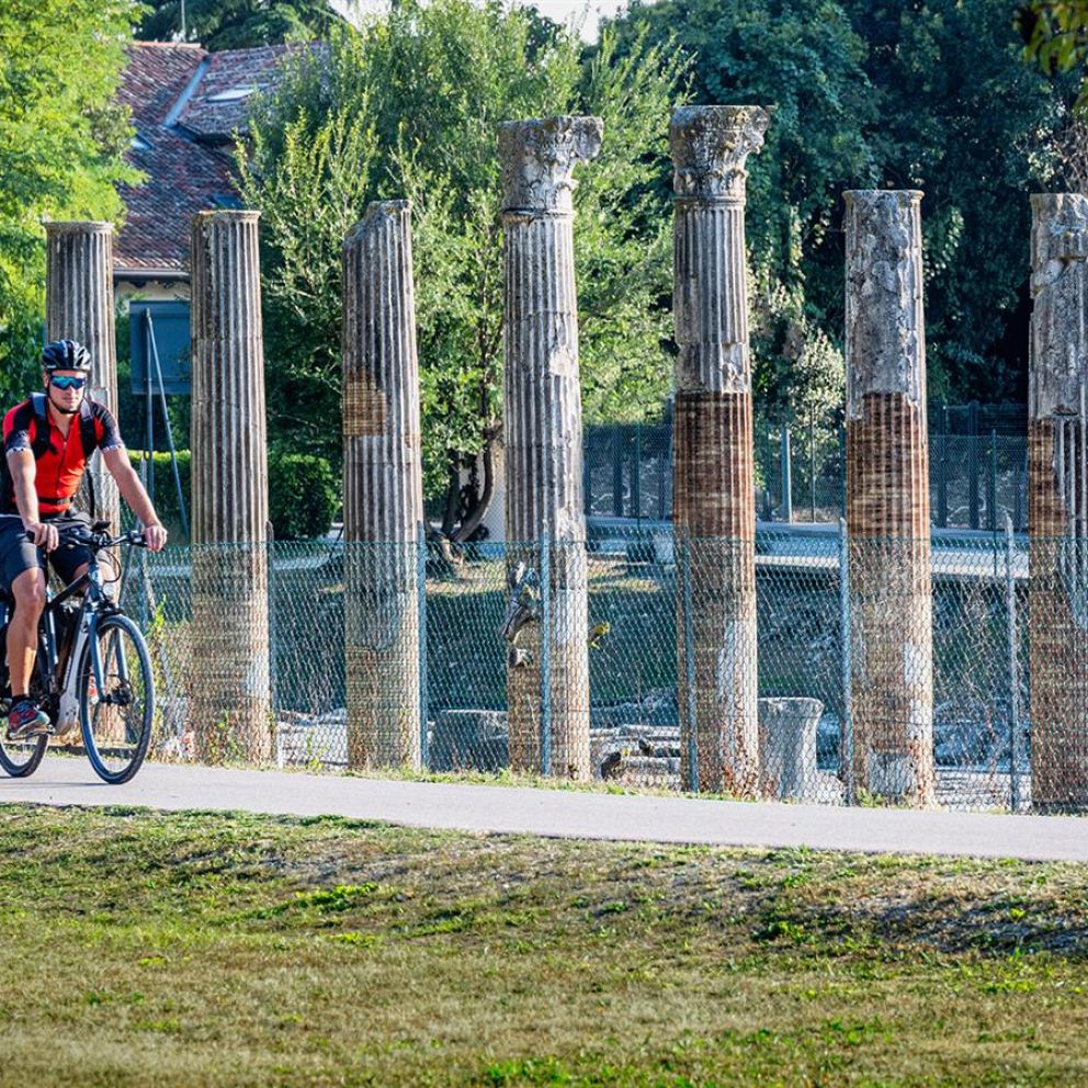 Cycle path near the Roman Forum of Aquileia, Friuli Venezia Giulia, Italy: historical treasures and natural beauties on a bicycle journey.