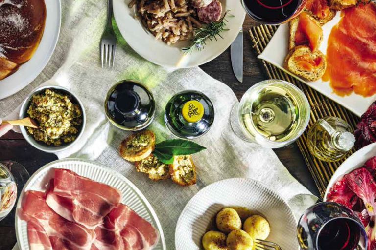 Immerse yourself in the diverse Friulian cuisine—rich flavors from cheeses and cured meats to wines and sweets. Uncover the history, culture, and tastes of FVG.
