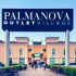 Facciata principale dell'elegante Palmanova Outlet Village, un luogo dove lo shopping diventa un'esperienza di stile, comfort e convenienza.